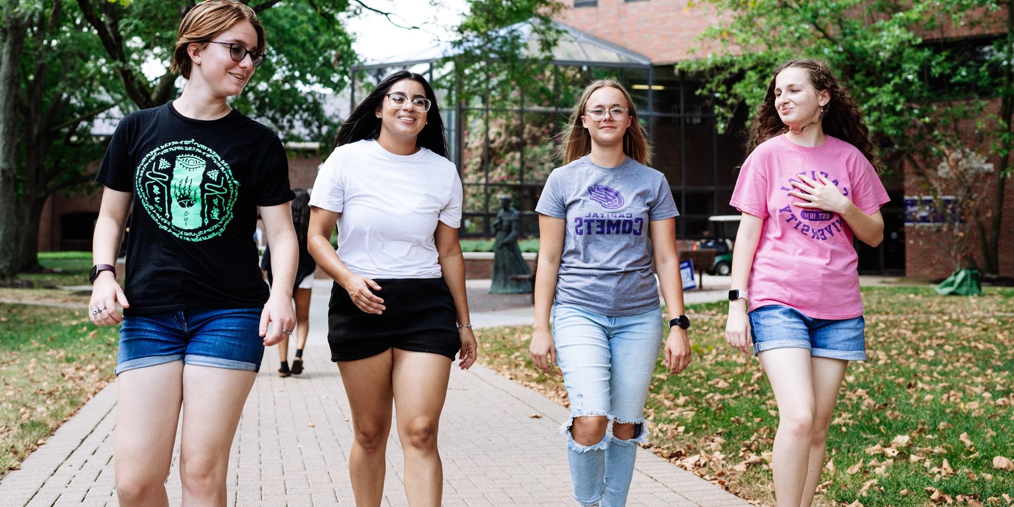 Four Students Walking Min